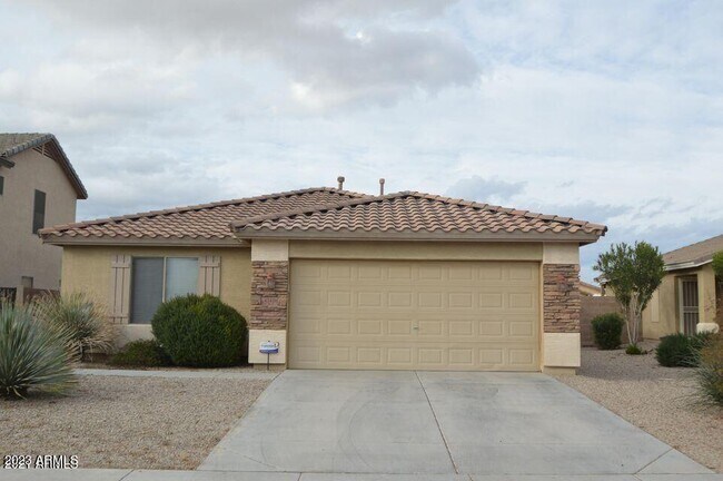 Foto del edificio - 42426 W Desert Fairways Dr