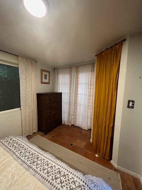 bedroom dresser and closet/ french doors to deck - 3219 McManus Ave