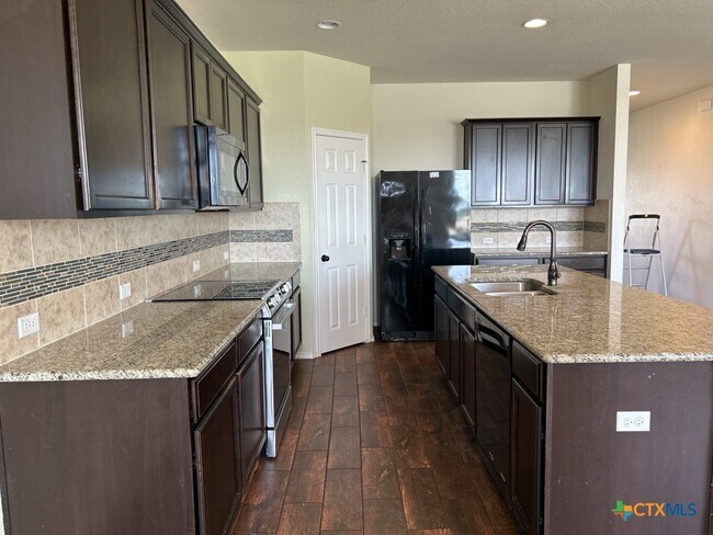 Foto del edificio - 8902 Bowfield Dr