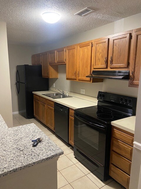 Kitchen with new appliances - 6260 Rosecroft Dr