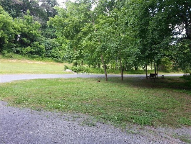 Building Photo - 6685 Maid Marion Close