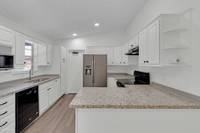 Building Photo - 3 br, 2 bath House - 6620 SW 6th St