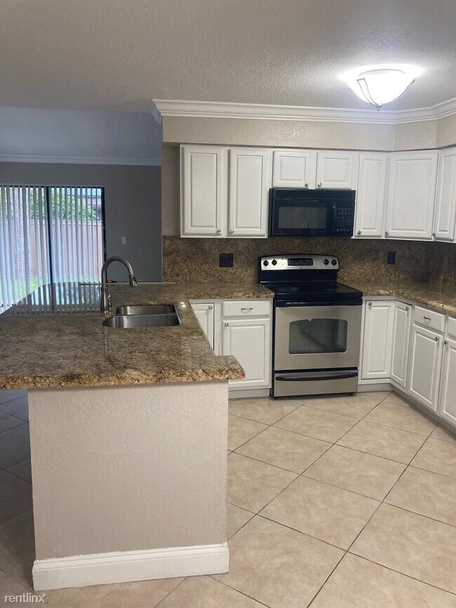 Building Photo - 3 br, 2 bath House - 3121 NW 23rd Ct