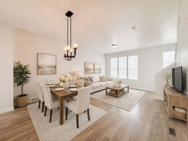 Building Photo - Stunning and Spacious 3BR 3BA Townhouse w/ Quartz Kitchen + Garage Parking + Modern Finishes in E...