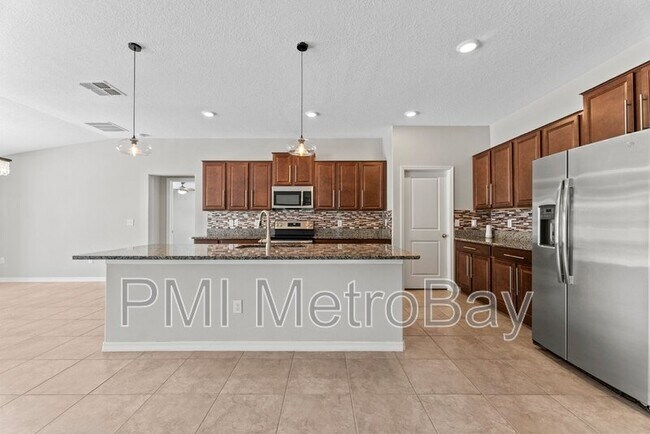 Foto del edificio - 9703 Sage Creek Dr