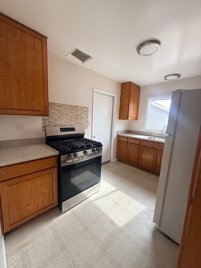 Foto del edificio - Lovely house with a large backyard