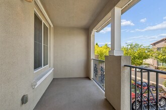 2BR, 2.5BA 1,317SF - Balcony - Campus Oaks Apartments