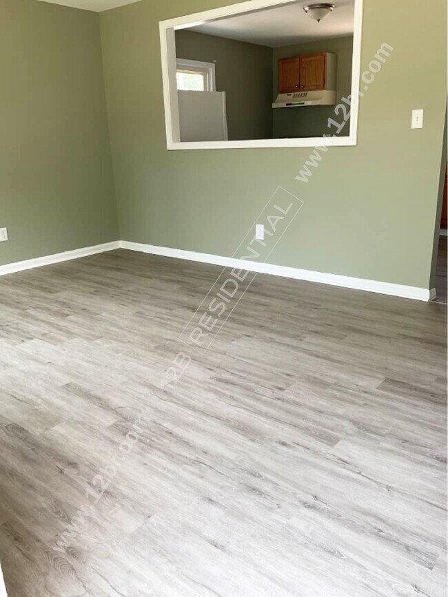 Building Photo - Renovated 4-Bedroom Home with Fenced Yard