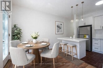 Building Photo - 1969 Queen St E