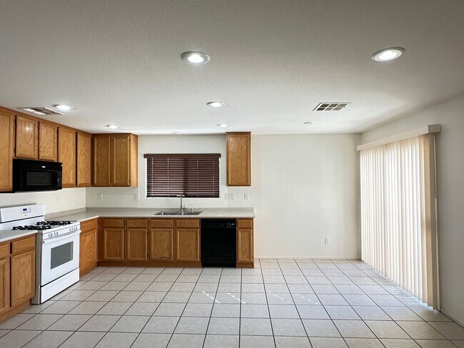 Building Photo - Huntington Village A At Rhodes Ranch