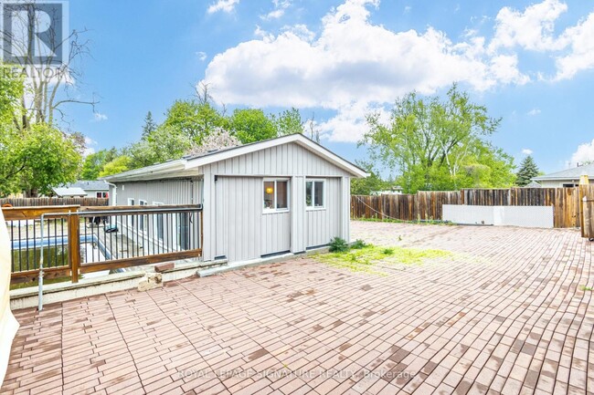 Building Photo - 235 Cedar Crescent