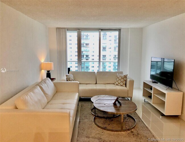 Building Photo - 19370 Collins Ave
