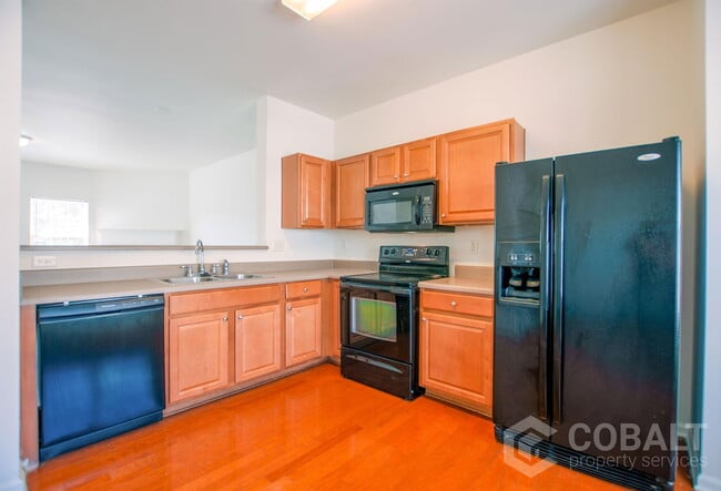Photo - 6823 Blackstone Pl Townhome