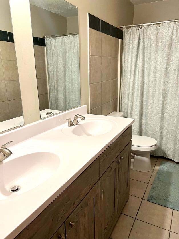 Remodeled bathroom with double sink - 6501 Channel Rd NE