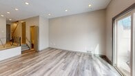 This contemporary townhouse in Bloomfield, CT offers a well-designed living space of 940 square feet spread across two floors. The home features 2 bedrooms and 3 bathrooms, providing ample space and privacy for residents and guests.

The interior is characterized by its modern aesthetics, with neutral tones and sleek finishes throughout. The living areas boast attractive gray wood-look flooring, creating a cohesive and stylish appearance. Large windows in the living room and bedrooms allow for abundant natural light, enhancing the sense of spaciousness.

The kitchen is a highlight, featuring a practical U-shaped layout with granite countertops, stainless steel appliances, and ample cabinet space. A window above the sink adds natural light to the cooking area.

The primary bedroom, measuring 170 square feet, offers a generous space for relaxation. Built-in closets provide convenient storage solutions. The bathrooms are well-appointed, with one featuring a combination of marble-look and neutral tiles, along with a modern vanity and mirror.

An additional notable feature is the laundry area, conveniently located within the home and equipped with full-sized appliances. The property's layout and amenities make it an ideal choice for those seeking a low-maintenance yet comfortable living space in a desirable location.