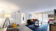 Located at 8250 Townsend St in Fairfax, Virginia, this one-bedroom, one-bathroom residence offers a thoughtfully organized single-floor layout. The living room serves as the heart of the home, featuring soft carpet flooring, a large sliding glass door that invites natural light and outdoor views, and louvered closet storage along one wall. The space flows naturally into the dining area, which is appointed with a window overlooking the exterior and provides a comfortable setting for everyday meals. The kitchen is efficiently designed with tile flooring and sufficient counter and storage space for daily use. The bedroom is generously proportioned, featuring multiple windows that fill the room with natural light, plush carpet underfoot, and dual closets offering substantial storage. Clean white walls throughout lend a bright, airy feel to every room. The full bathroom includes a tub-shower combination with white tile surround and overhead cabinetry for added storage. A connecting hallway ties all rooms together in a practical and accessible layout. Overall, the residence presents a clean, well-lit, and functional living environment well-suited for single occupancy or couples in the heart of Fairfax.