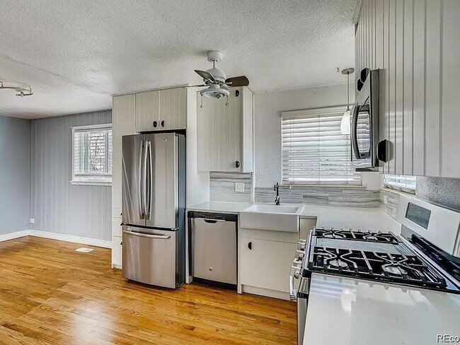 Side view of kitchen from backdoor. - 1132 S Zenobia St
