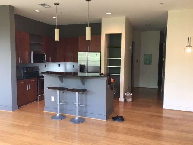 Living Room and Open Kitchn together with nook area for bistro table or office desk. - 747 Ralph McGill Boulevard Northeast
