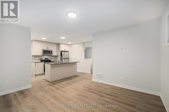 Photo du bâtiment - 801-801 Glenroy Gilbert Dr