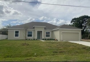 Building Photo - 1142 SW Edinburgh Dr