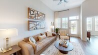 Located at 8120 Preston Road in Plano, TX, this thoughtfully designed one-bedroom residence offers a seamless blend of modern aesthetics and functional living. The single-floor layout maximizes every square foot through an open-concept design that connects the kitchen, dining, and living areas into one cohesive space.

The kitchen is a standout feature, showcasing two-tone cabinetry with warm wood lower cabinets and crisp white upper cabinets, complemented by granite countertops, a subway tile backsplash, stainless steel appliances, and a central island that doubles as a casual dining and prep area. Soaring ceilings amplify the sense of space throughout.

The living room benefits from tall ceilings and large windows that invite an abundance of natural light, with direct access to an outdoor area. Light-toned hardwood-style flooring runs consistently through the space, adding warmth and continuity.

The spacious primary bedroom is a tranquil retreat, featuring large windows with ample natural light, clean white walls, and the same hardwood-style flooring. A wide entryway corridor connects the rooms with a practical and polished transition space.

The overall ambiance is contemporary and airy, with a neutral palette of whites and warm wood tones creating an inviting and stylish environment in the heart of Plano.