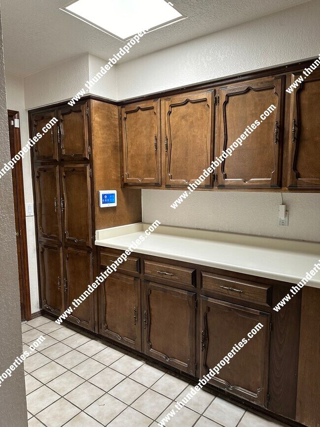 Building Photo - Great NE Heights 4 bedroom home with a pool