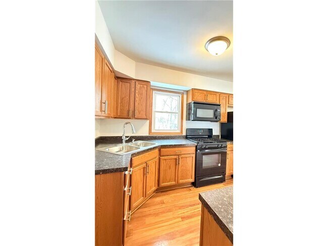 Building Photo - 6412 Xenium Ln N