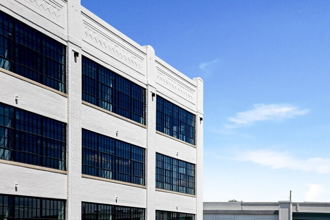 1913 brick, repointed and repainted, not replaced. - Cole Motor