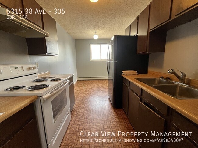 Photo du bâtiment - 2 bed,1 bath suite in Taber Manor! ??Showings NOW at (825) 888-2024??