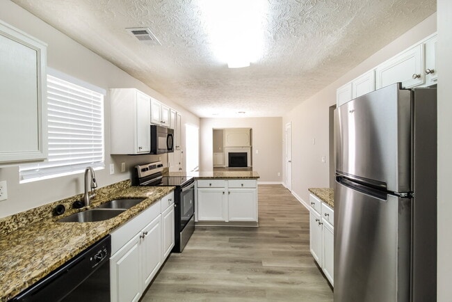 Building Photo - 6583 Carriage Ln