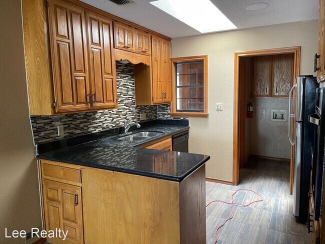 Building Photo - 2 br, 2 bath House - 1128 REDBUD  AVE.