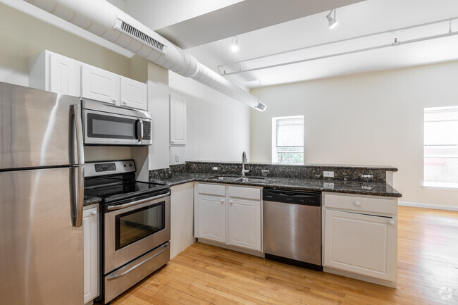 Fully Equipped Kitchen with Bar Height Seating - 221 Glen St