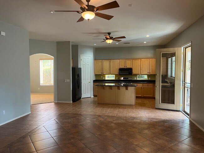 Building Photo - Corner 3 Bedroom Home + 3 Car Garage in Gr...