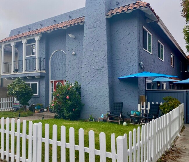 2416 Curtis, street view (Unit 1 pictured). - 2416 Curtis Ave