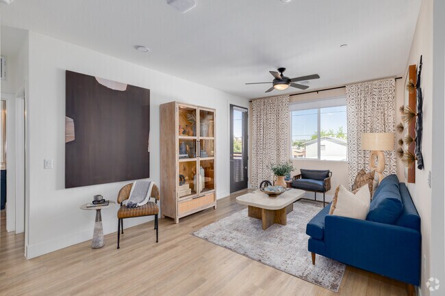 2 habitaciones, 2 baños - 1115 pies cuadrados - Sala de estar - Aura Uptown