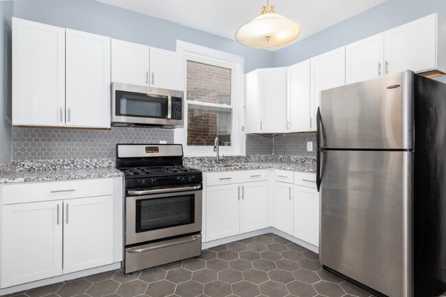 Building Photo - 7514 S Langley Ave