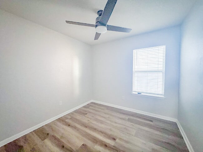 Building Photo - Open Floor Plan! Nice corner lakefront home!  Community pool, playground and walking trails.