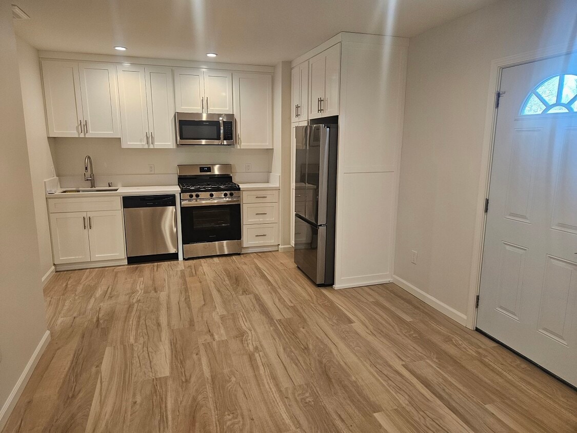Living Room and Kitchen - 17140 Rayen St