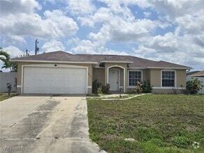 Building Photo - 402 NE 23rd Pl