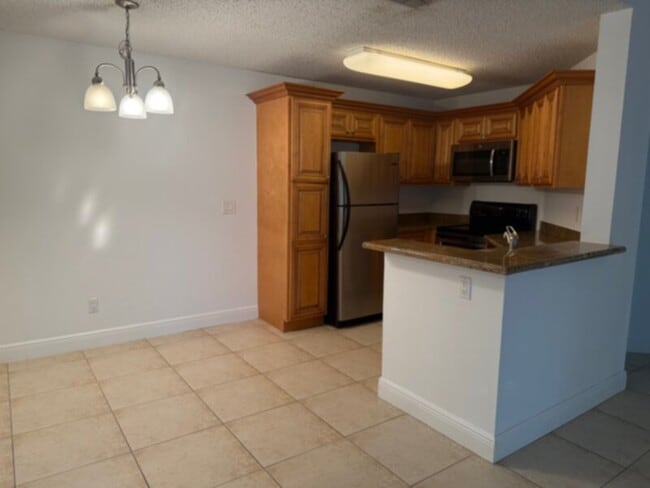 Building Photo - Lake Mary 3 Bedroom, 2 Bath Gated Condo wi...