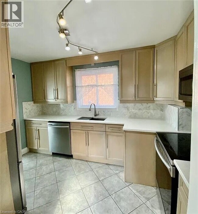 Photo du bâtiment - 7016 Hagar Ave