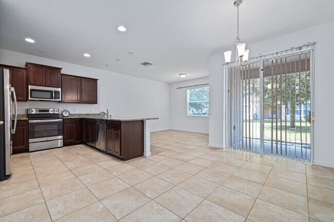 Building Photo - "Charming Seven Oak Community 3-Bedroom Rental Home with Granite Countertops in Wesley Chapel, FL"