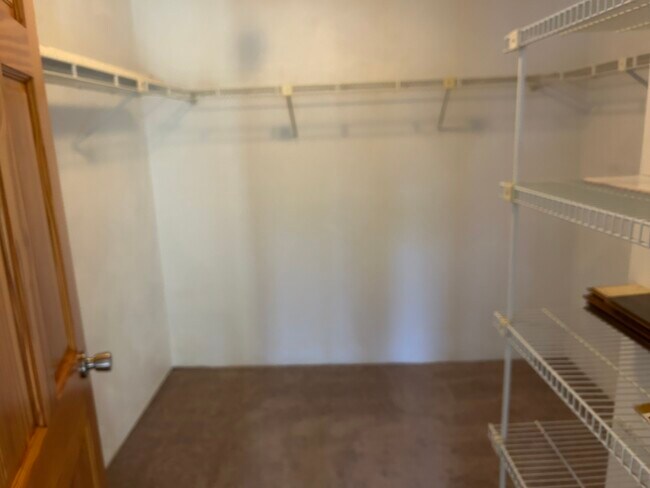 Walk in closet off master bedroom - 189 Littleton Rd