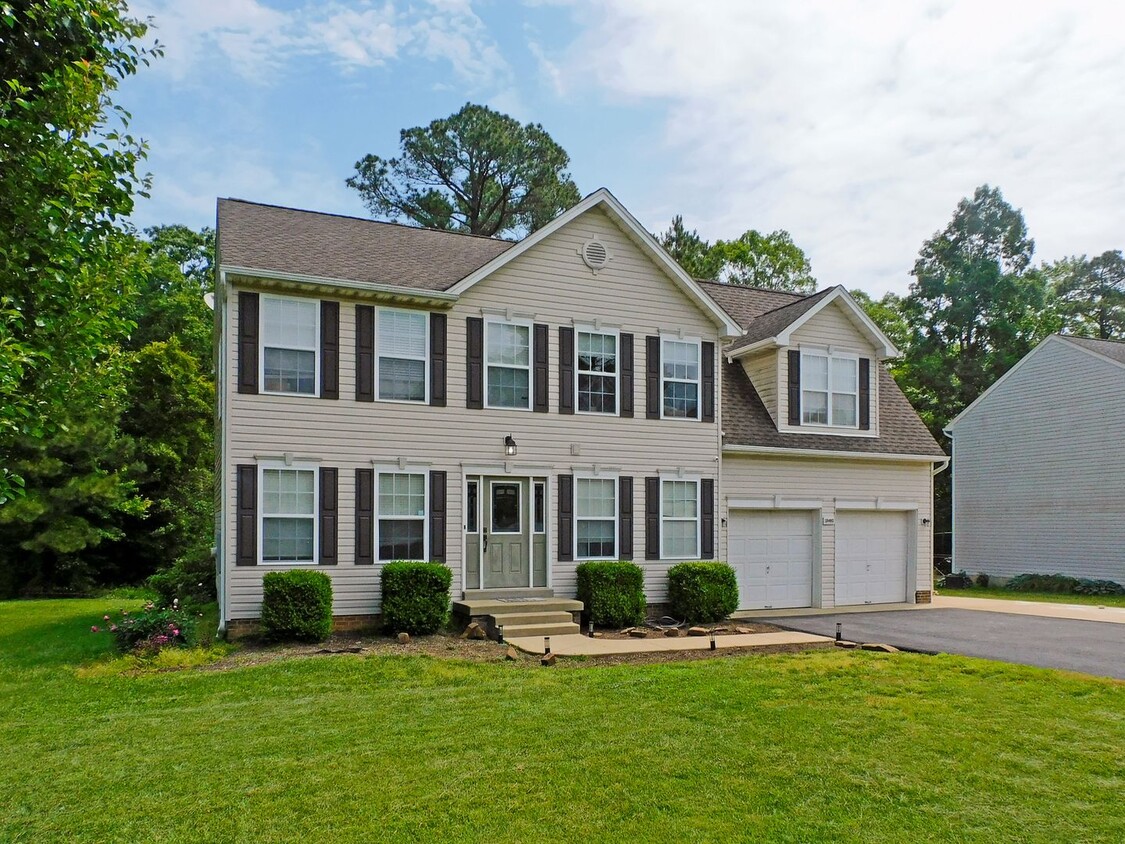 Primary Photo - Colonial with Finished Basement and 2 Car ...