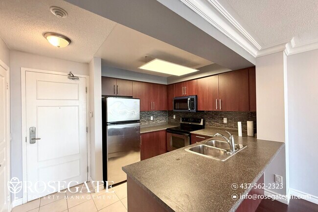Building Photo - Modern 1-Bedroom + Den, 1-Bath Condo in Ri...