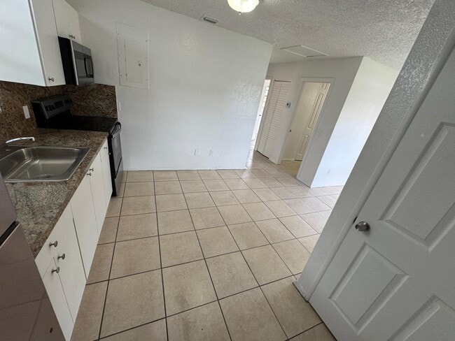 Photo - 300 NW 28th Way House