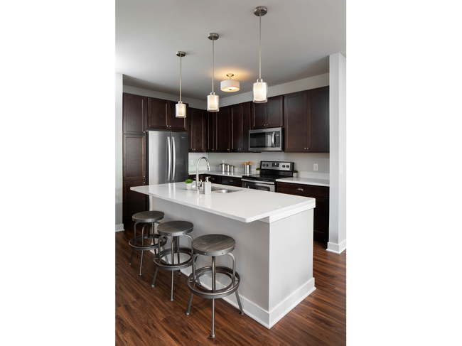 Cocina de apartamentos Arrabelle con isla - Arrabelle Apartments