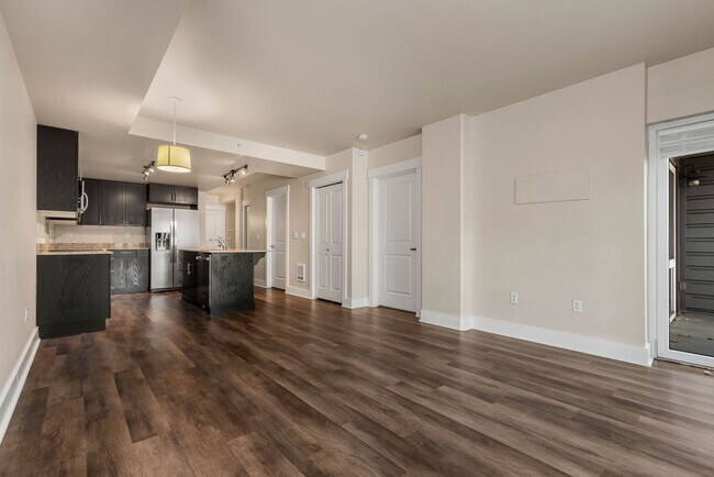 Building Photo - Modern 1-Bedroom + Den Condo with Parking, Storage & Rooftop Access – Marselle Condominiums