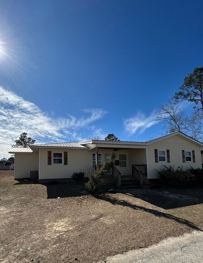 Building Photo - 112-114 W 10th St