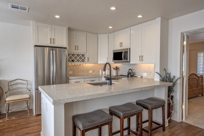 Building Photo - Rates Vary $2,245 - $3,495